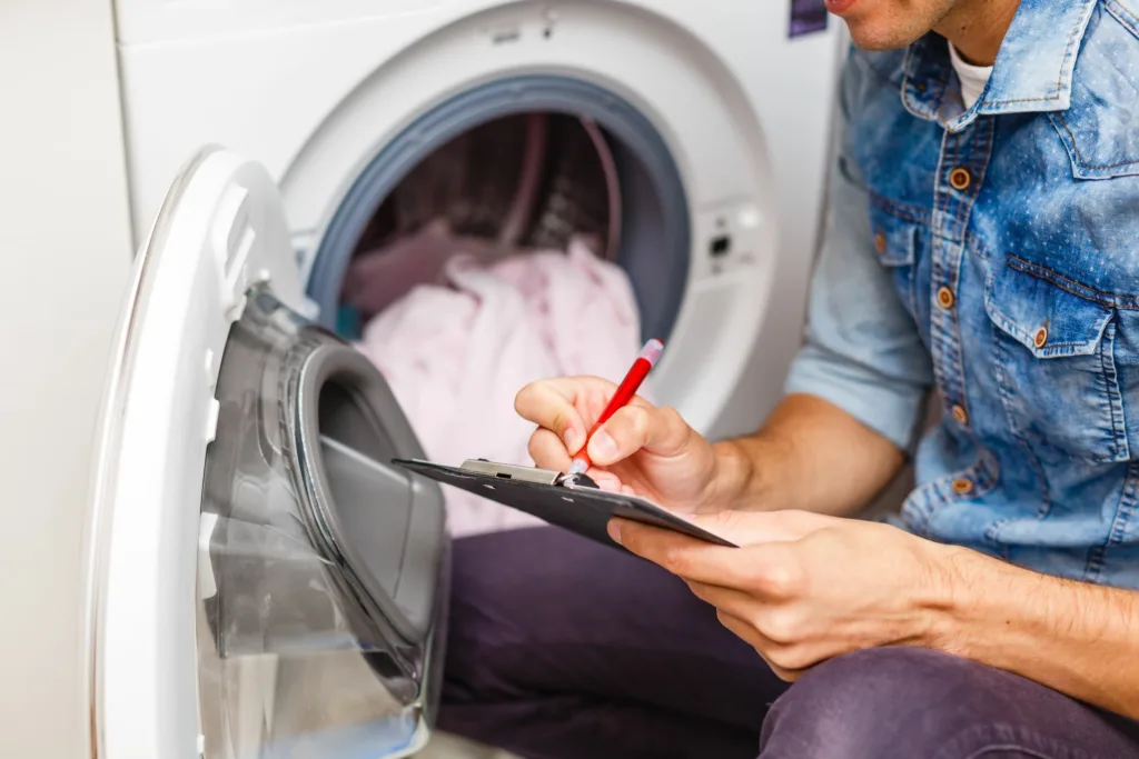 beko washing machine problems - technicians carrying out repairs