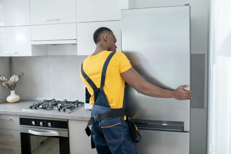 technicians fixes samsung fridge not cooling