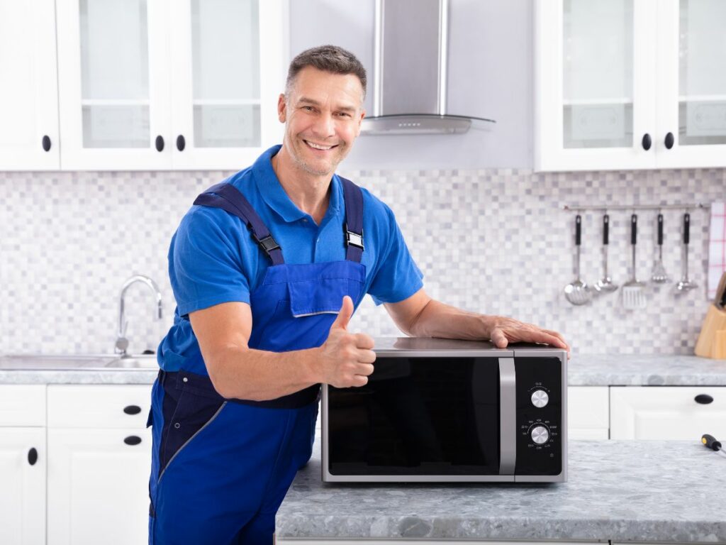 Microwave repair Durban - technician completing successful fix