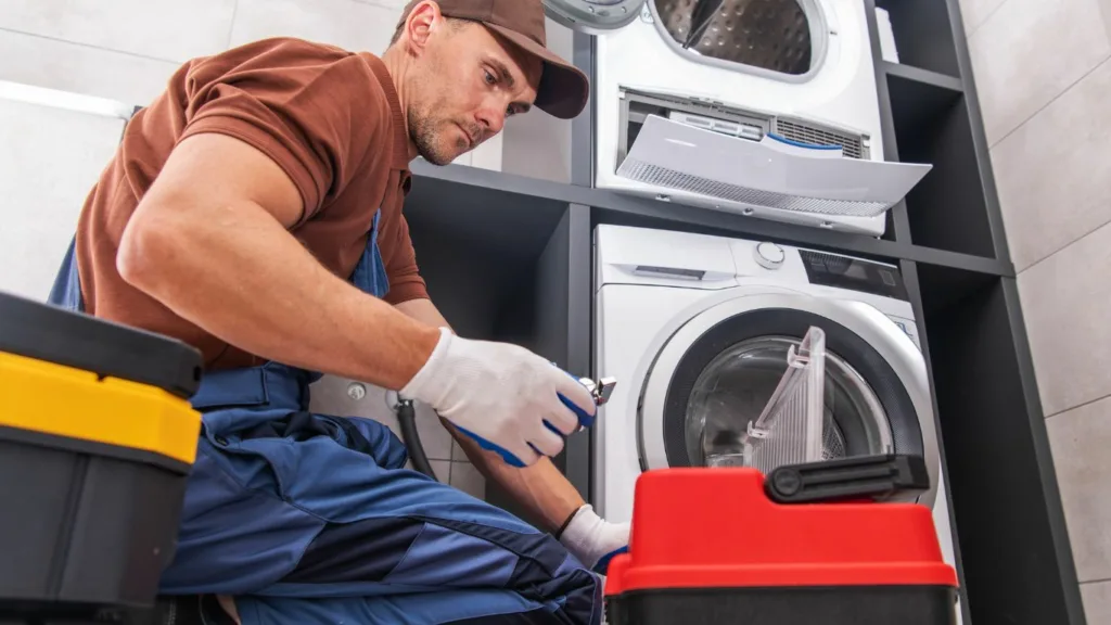 front loader washing machine problems and solutions - a technician fixes appliance in Durban