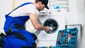 Our technician fixing a washing machine in a home in Verulam