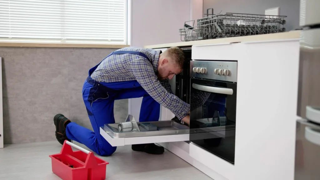 Expert hands diagnosing and fixing a Bosch dishwasher problem in a durban home