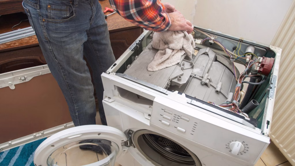 Home appliance technician servicing equipment in Newlands Durban
