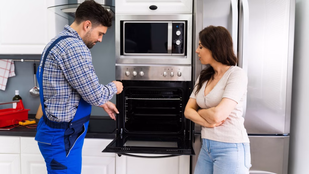 Professional fixing kitchen appliances in a Newlands Durban home