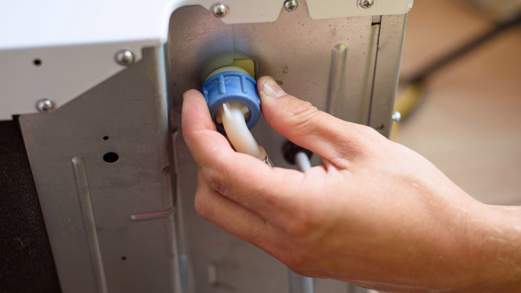 Technician repairing the door, offering professional services for efficient and reliable dishwasher repairs near Kloof