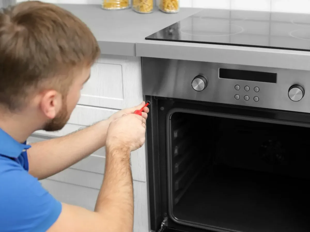 Technician repairing a samsung oven and stoves in Durban