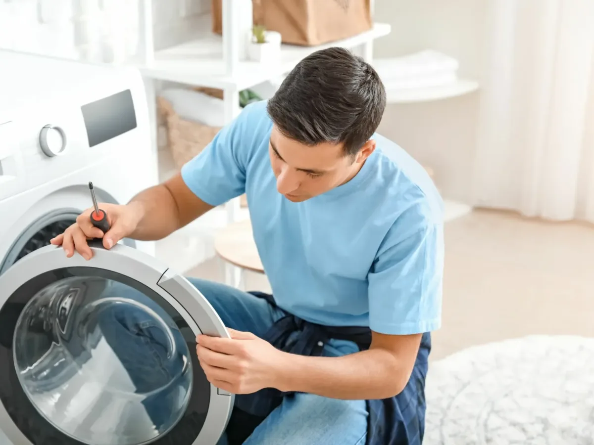 samsung service center repair in durban Expert repairing a broken Samsung washing machine in Pinetown, South Africa